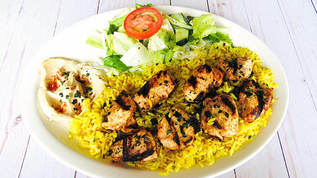Chicken Kebab Dinner · Top menu item. Chicken marinated on skewers with special seasonings and grilled to perfection. Served with rice, hummus, salad, and vegetables.