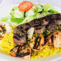Chef'S Plate Dinner · Beef kebab, kafta kebab and chicken kebab. Served with rice, hummus, salad and vegetables.