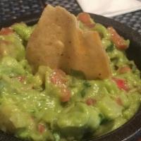 Large Guacamole · Fresh avocado blended with onions, tomatoes, cilantro.