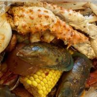 The Big Combo · 1 king crab leg, 1 snow crab cluster, 1/2 lbs of shrimp, 1/2 lbs of crawfish, 1/2 lbs of cla...