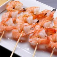 Bbq Shrimp (G) · Grilled shrimp skewers marinated in Thai spices and grilled with spicy lime sauce.