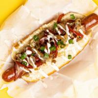 Chili Dog · Hot dog smothered in chili and served on a fluffy bun.