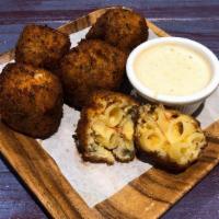 (5) Mac N' Cheese Poppers · Shredded beef, corn and bell pepper.