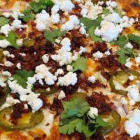 Mexican · White bean sauce, chorizo, jalapeno, red onions, cilantro, feta cheese & mozzarella cheese.