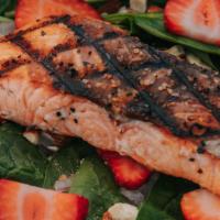 Salmon Salad · Gluten-free. Spinach and arugula, red onion, walnuts, feta, herb champagne vinaigrette