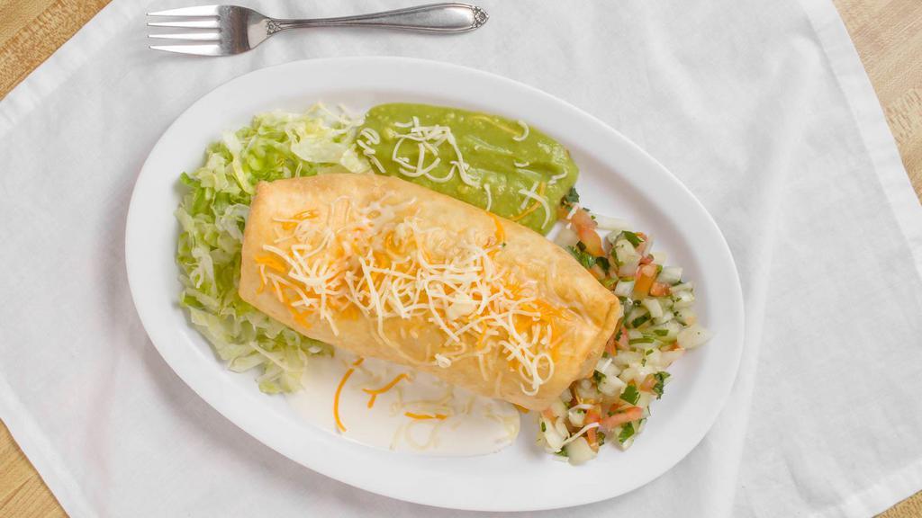 Chimichanga Style · With lettuce, sour cream, pico de gallo, cheese and guacamole.  Choice of meat shreded beef,chicken or ground beef