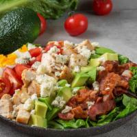Classic Cobb Salad · Grilled chicken breast, bacon, hard boiled egg, avocado, romaine lettuce, tomato, Blue chees...