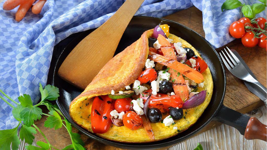 Greek Omelette · Feta cheese, tomato, avocado, red onions and Kalamata olives.