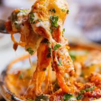 Lasagna · Freshmade Pasta, Layered Ground Filet Mignon & Wagyu Bolognese, Spinach, Ricotta, Mozzarella...