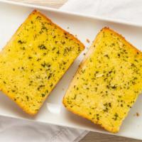 Garlic Bread (2) · Two Large Slices of Fresh Baked Italian
Bread Brushed with Eddie’s Garlic Spread.