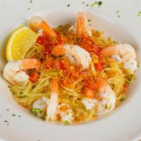 Shrimp Scampi · Large tiger shrimp sautéed in a lemon, garlic, butter, and white wine sauce, topped with rom...