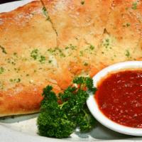 Y.O. Calzone (Individual · Create your own stuffed with ricotta, two traditional toppings, and mozzarella.