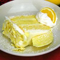 Lemon Custard Cake · Layered with lemon cream custard, covered with cream cheese frosting.