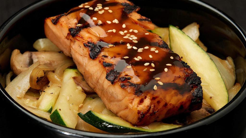 Salmon Teriyaki Bowl · Grilled salmon served over rice with sauteed zucchini, mushrooms, and onions, topped with teriyaki sauce