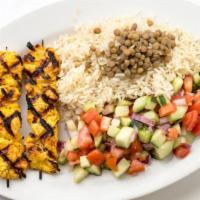 Chicken Skewers · Chicken skewers, Caesar or Garden salad, rice, hummus, pita