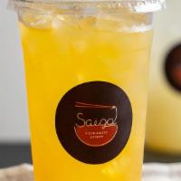 Kumquat Spritzer · Our seasonal drink! Hand-pressed organic kumquats shaken with lime and soda, served over ice.