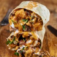 Peri Peri Chicken Burrito · grilled marinated chicken, nando's peri peri sauce, ranch dressing, cilantro, pickled red on...