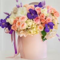 Purple Orchid · Visit our website for more options www.thedezignshop.com
This blushing bouquet is arranged w...