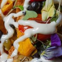 City Zucchini · golden fried zucchini topped with caramelized onions, cherry tomatoes, . olives, capers, bla...