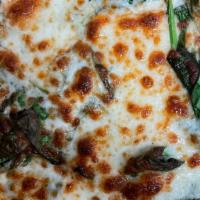 Florentine Pizza · Spinach, garlic, olive oil, Ricotta & Mozzarella cheese.