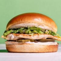 The Signature Grilled · Our signature juicy grilled chicken breast with pickles, mayo, shredded lettuce in between a...