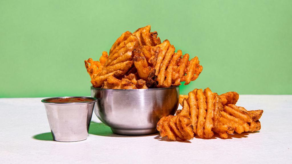 Waffle Fries · crispy waffle fries served with a side of truffle ketchup