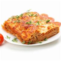 Lasagna Classico · Beef, tomato, mozzarella over layers of tender pasta, topped with marinara sauce and baked w...