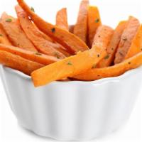 Sweet Potato Fries · Perfectly crispy sweet potatoes fried to a golden brown.