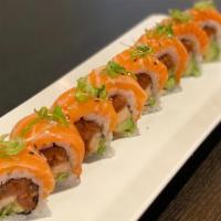 Mega Omega 3 Roll · Fresh salmon stuffed with spicy tuna, salmon tempura and avocado. Served with tangy creamy y...