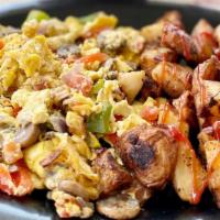 Veggie Scramble · Vegetarian. Bell peppers, mushrooms, onions, tomatoes, and egg scramble with a side of red p...