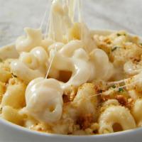 Small Mac N Cheese · White cheddar mac n cheese. Comes with breadcrumbs and extra cheese upon request.