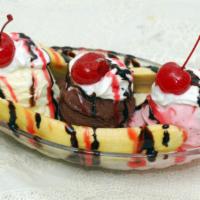 Banana Split · Pick three of your favorite ice cream flavors, banana slices, your choice of toppings, all c...