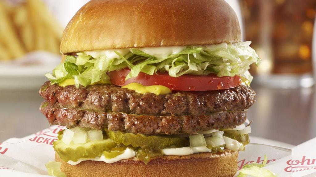 The Original Double · The burger that started it all. Double the 1/4 lb. patties made of 100% fresh, never frozen certified angus beef, grilled to perfection and topped with lettuce, tomato, chopped onion, relish, pickles, mustard and mayo..