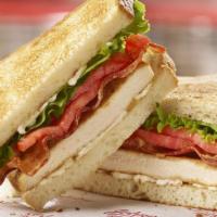 Chicken Club Sandwich · Join the club! A juicy grilled chicken breast is topped with bacon, lettuce, tomato and mayo...