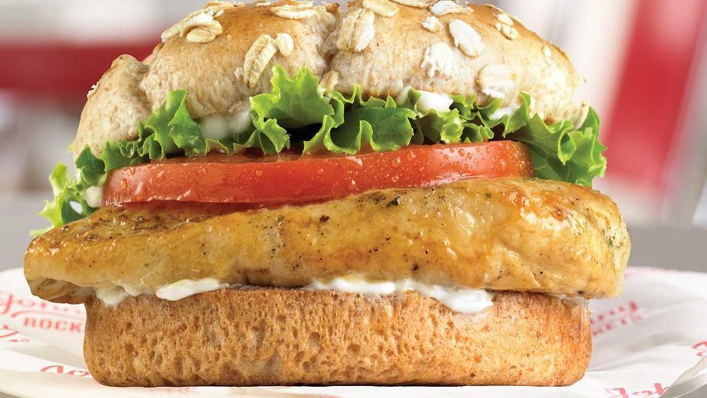 Grilled Chicken Sandwich · A juicy grilled chicken breast is topped with lettuce, tomato and mayo on a whole wheat bun.