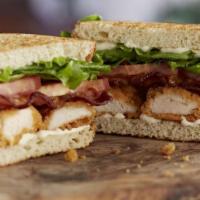 Crispy Chicken Club Sandwich · Fried for that extra crunch, this sandwich features the crispiest chicken tenders topped wit...
