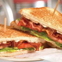 Bacon, Lettuce & Tomato Sandwich · The all American classic sandwich features thick Applewood smoked bacon topped with lettuce,...