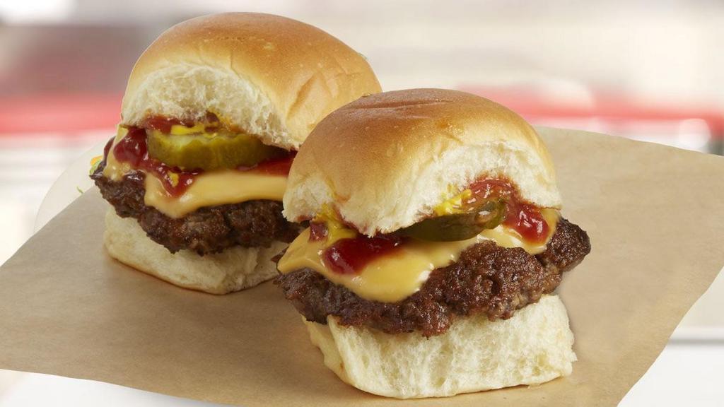 Kids Mini Burgers · Two mini burgers made of 100% fresh, never frozen certified angus beef patties, grilled to perfection and topped with choice of ketchup, mustard and pickles.