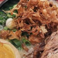 Kai'S White Ramen · Most popular pork soup, salt base, thin noodle, garlic butter, pork belly flavored egg, scal...