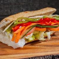 #9. Veggie · Shredded Lettuce, Tomatoes, Cucumbers, thinly shaved Carrots & Peppers