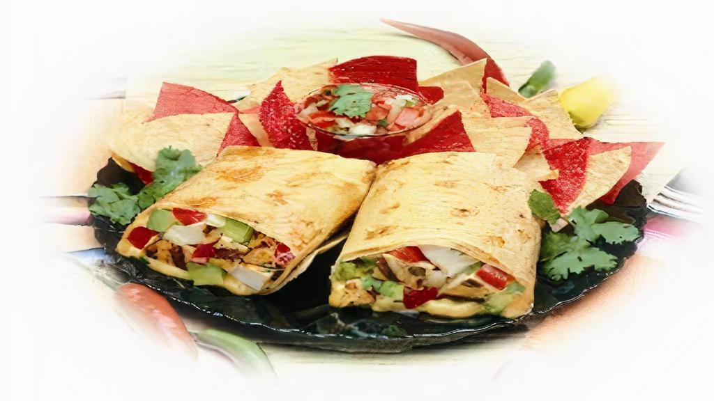 Charo Burrito · Cheese, fresh guacamole, mild pico de gallo salsa, and your choice of protein.