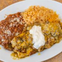 Chile Verde Burrito · Large flour tortillas stuffed with homemade chile verde and cheese. Topped with chile verde ...