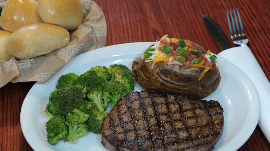 Original Ribeye (14 Oz) · Hand-cut in-house our 14 oz Ribeye steak is our most flavorful steak. A generous amount of Marbling ( Fat running through the steak) and our Original Roadhouse Steak Seasoning, this steak will always satisfy those cravings!