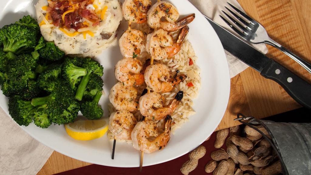 Mesquite Grilled Shrimp · Ten large shrimp skewered and seasoned with our special blend of spices. Served on a bed of rice. Grilled with your choice of garlic butter, original BBQ sauce or honey molasses BBQ sauce.