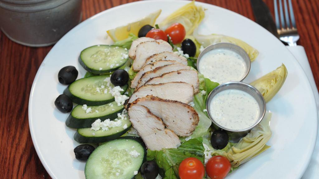 Harvester'S Special · Crisp romaine, artichoke hearts, cured black olives, crumbled feta cheese, sliced cucumber and cherry tomatoes. Served with our homemade lemon dill dressing.