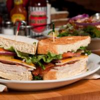 Original Roadhouse Club · Roasted turkey breast sliced thinly and piled high. Topped with crispy bacon, mild cheddar c...
