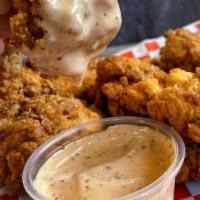 Popcorn Chicken · Popcorn Chicken with a side of Chix Sauce. Just Choose your spice level!!