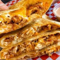 Quesadilla · Flour Toritilla, A mix of Mozzarella Cheese and Cheddar Cheese, Fried Chicken and our Chix S...