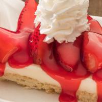 Strawberry Pizza · A buttery graham craker crust layered with sweet cream cheese topped with fresh strawberries...
