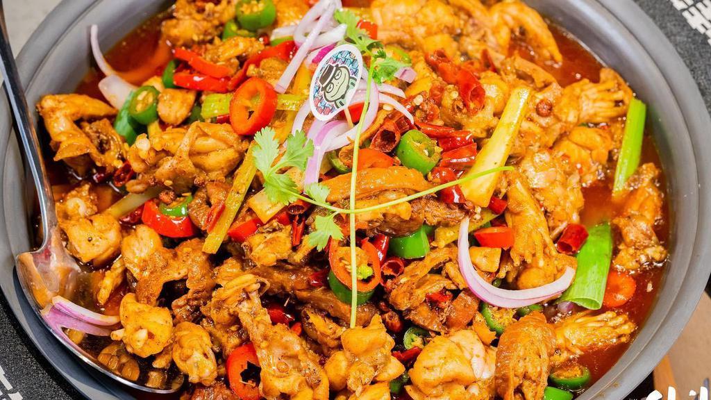 Fried Bullfrog With Intestines 牛蛙肥肠锅 · Fresh frog with intestines, spicy, size for 2-3 people.